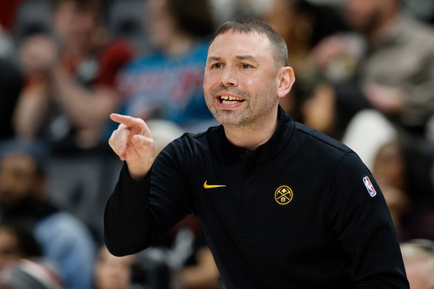 Nuggets head coach David Adelman directs his team during the first half against the Detroit Pistons, Tuesday, Feb. 3, 2026, in Detroit. (AP Photo/Duane Burleson)