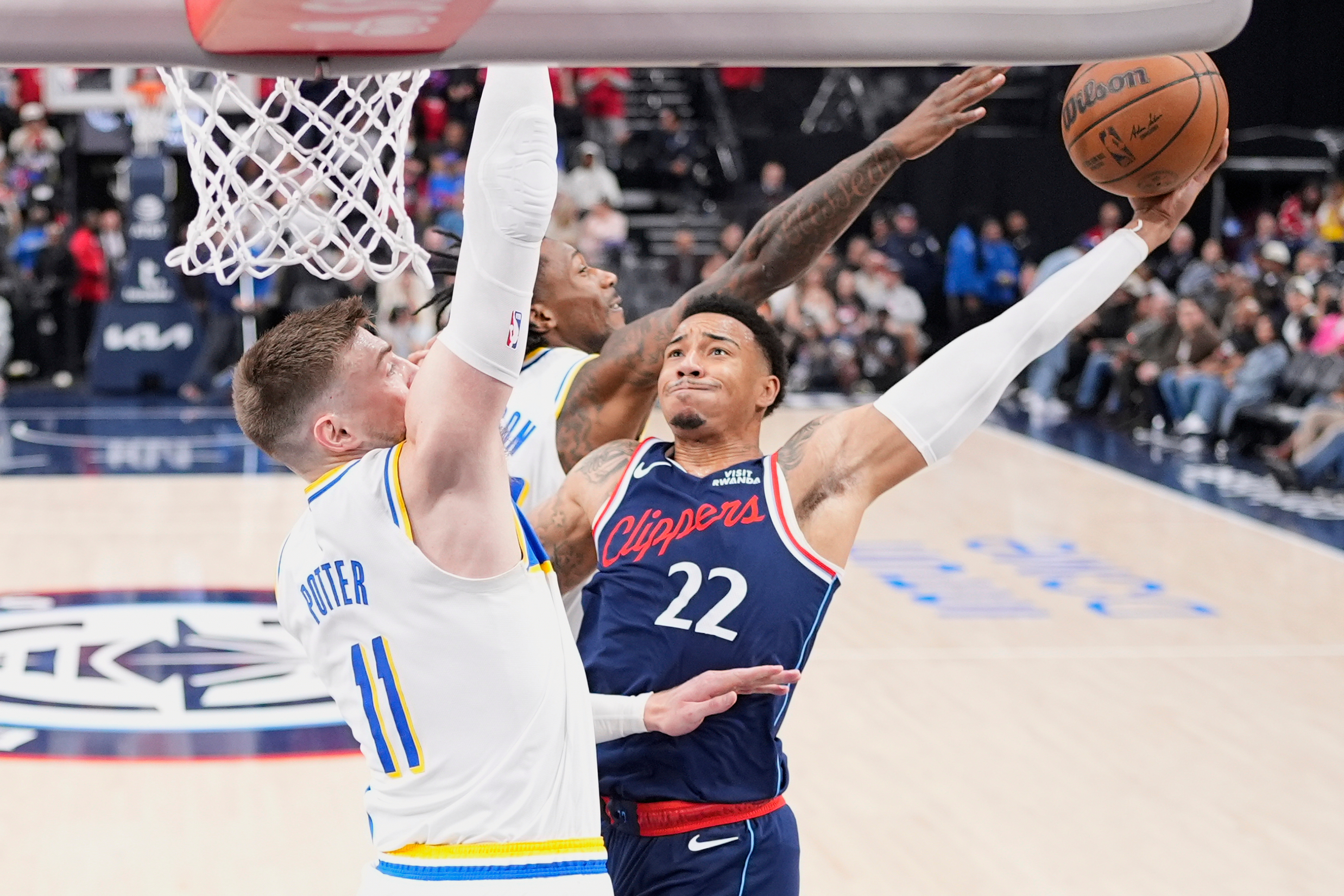 Clippers guard Jordan Miller, right, shoots as Indiana Pacers center...