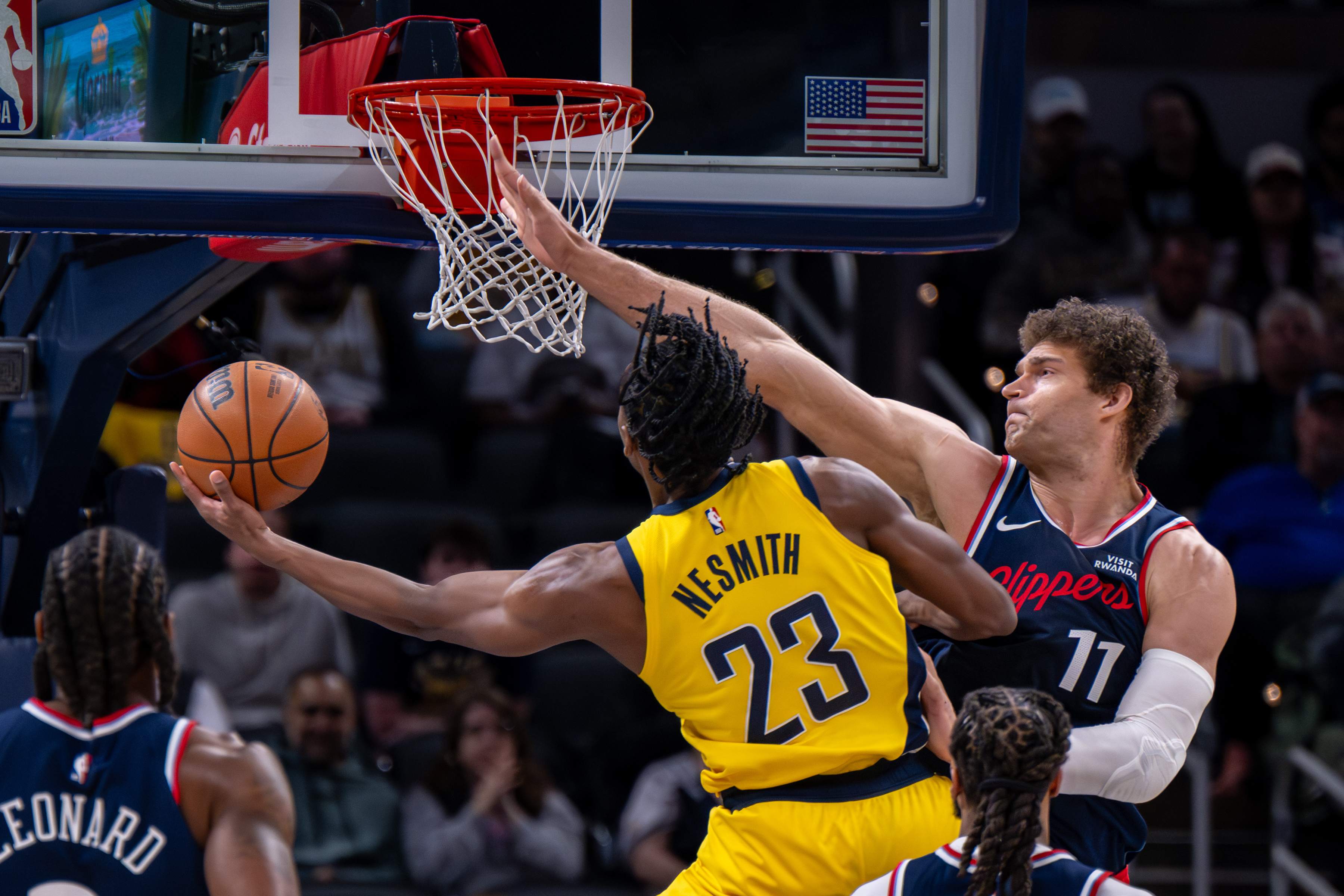 Clippers center Brook Lopez, right, reaches in an attempt to...