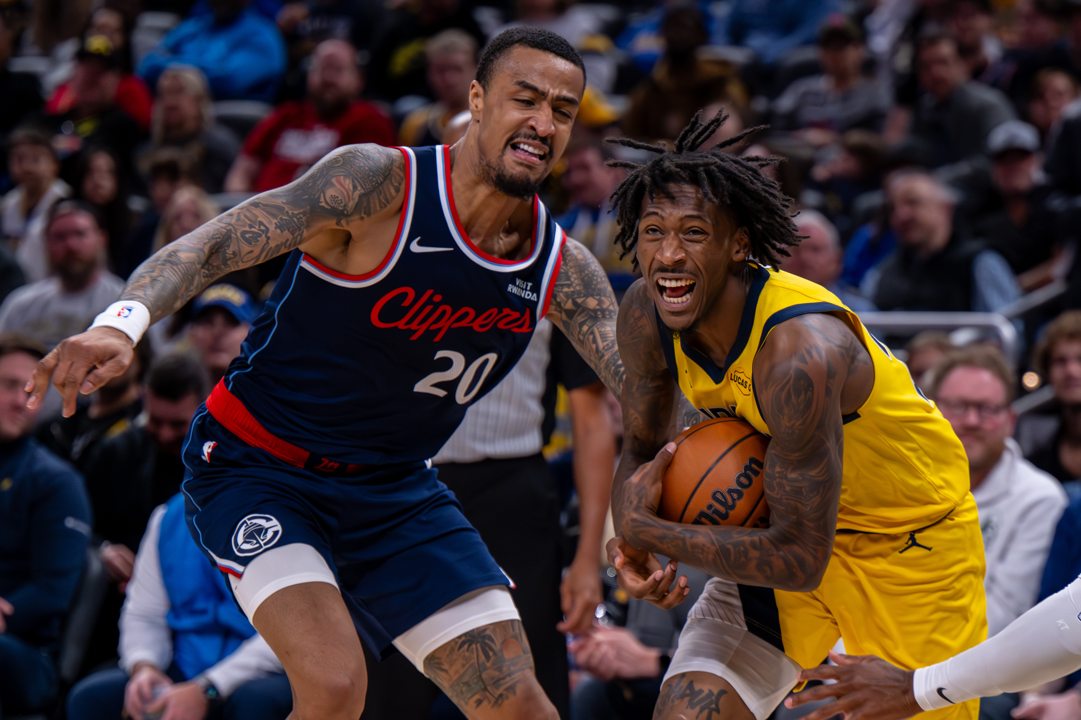 Indiana Pacers guard Quenton Jackson, right, makes a move around...