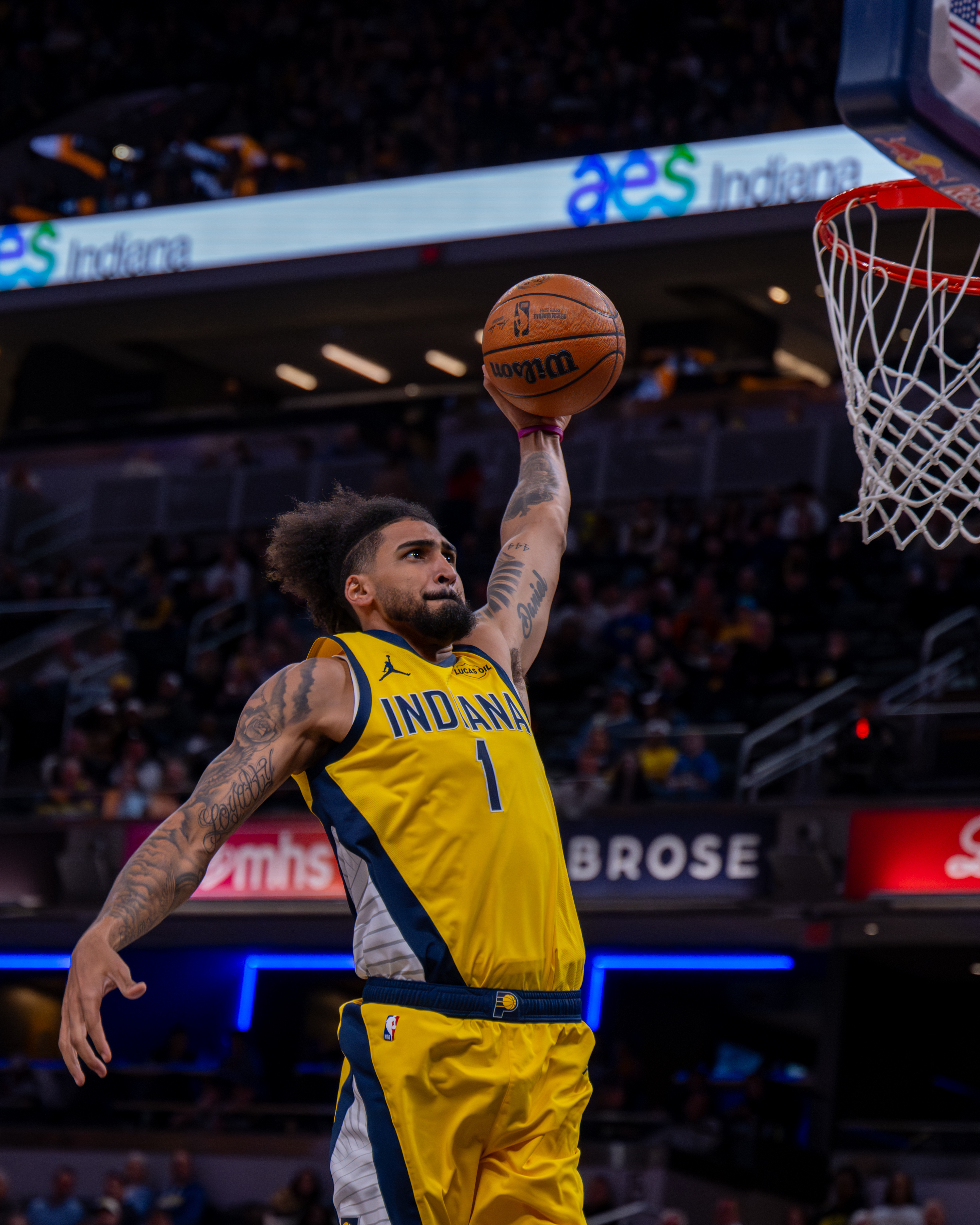 Indiana Pacers forward Obi Toppin (1) goes up to dunk...