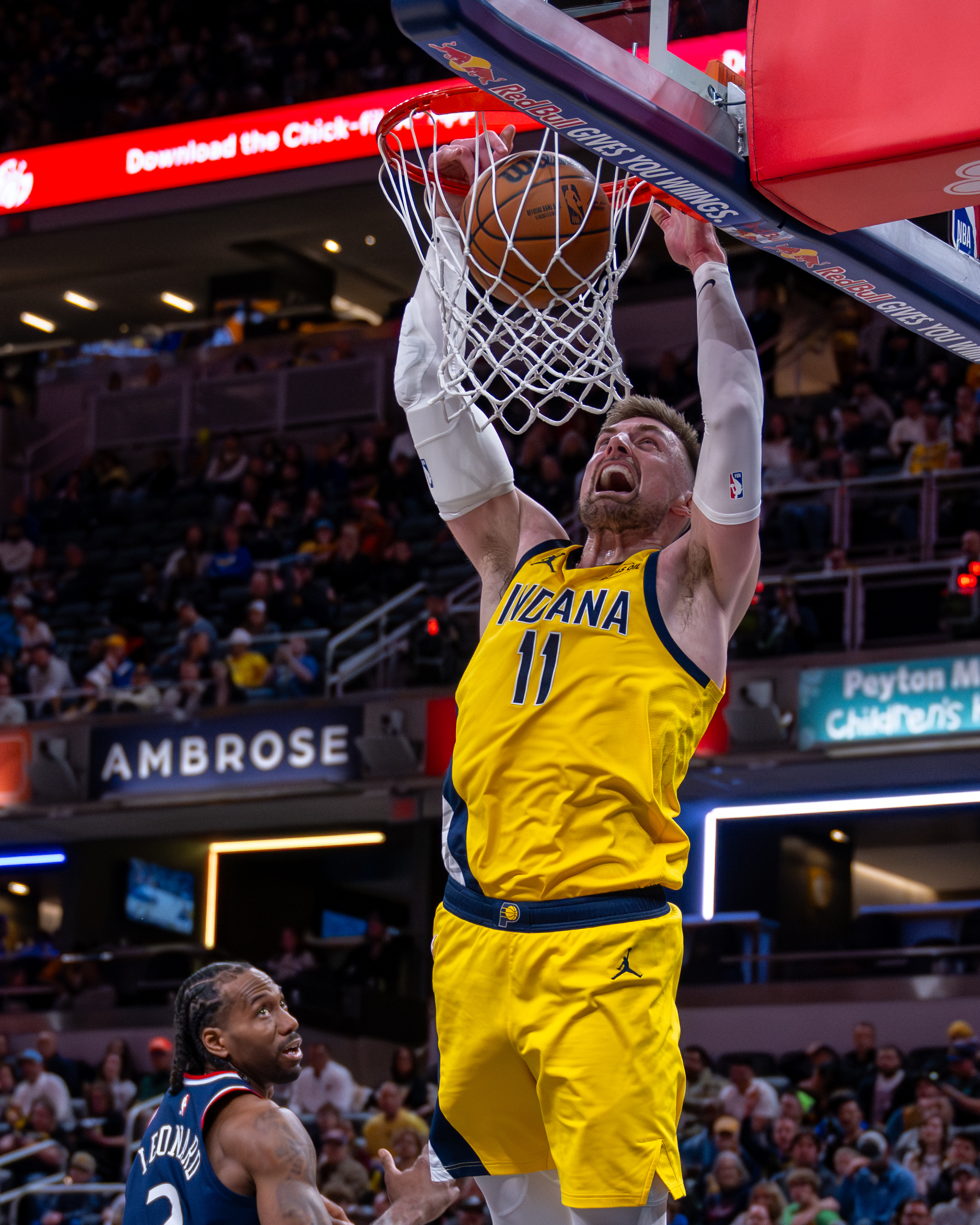 Indiana Pacers center Micah Potter (11) dunks during the second...