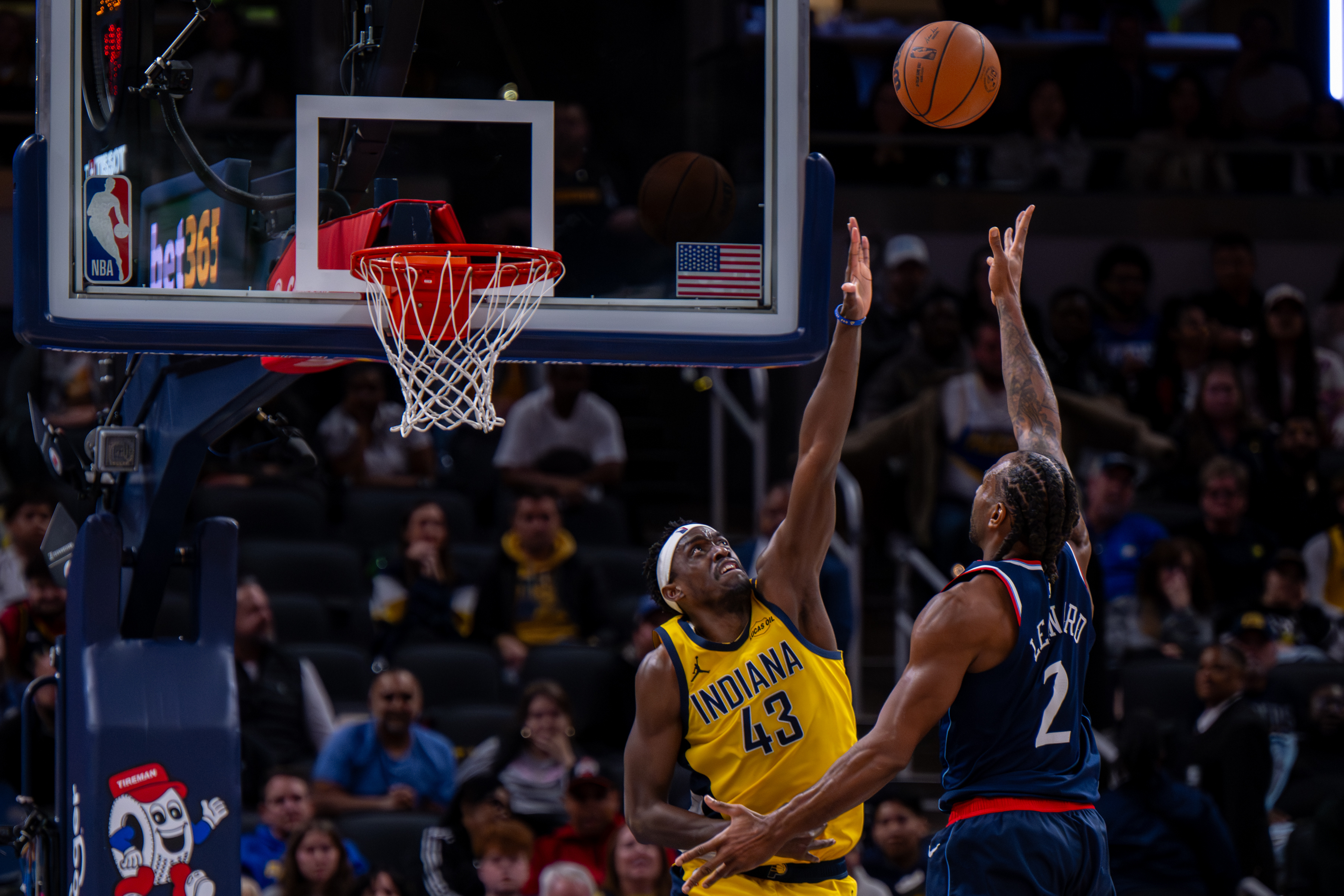 Indiana Pacers forward Pascal Siakam, left, reaches for a shot...
