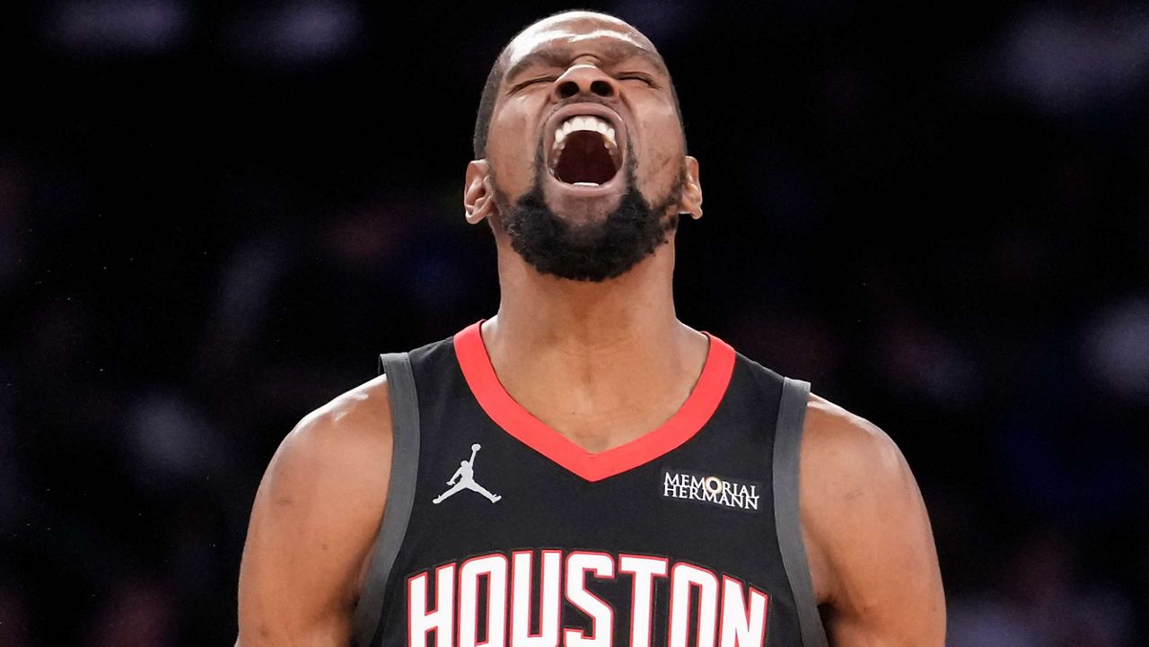 Houston Rockets forward Kevin Durant (7) reacts after scoring a 3-point goal during the second half of an NBA basketball game, Saturday, Feb. 21, 2026, in New York. (AP Photo/Yuki Iwamura)
