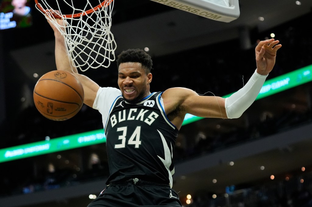 Milwaukee Bucks' Giannis Antetokounmpo dunks during the second half of an NBA basketball game against the Indiana Pacers, Sunday, March 15, 2026, in Milwaukee.