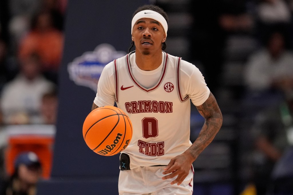 Alabama guard Labaron Philon (0) moves against Mississippi during the second half of an NCAA college basketball game in the quarterfinal round of the Southeastern Conference tournament, Friday, March 13, 2026, in Nashville, Tenn.