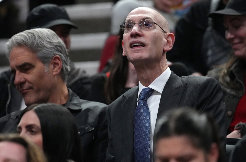 NBA commissioner watches a game between the Jazz and Trail Blazers earlier this month.