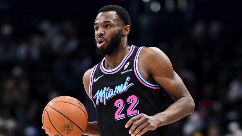 Andrew Wiggins #22 of the Miami Heat handles the ball against the Washington Wizards at Capital One Arena.