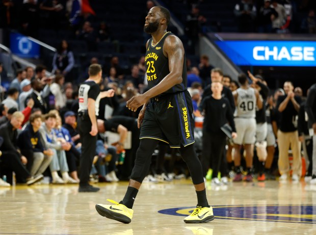 Golden State Warriors' Draymond Green (23) leaves the court following their 126-113 loss to the San Antonio Spurs at the Chase Center in San Francisco, Calif., on Wednesday, Feb. 11, 2026. (Nhat V. Meyer/Bay Area News Group)