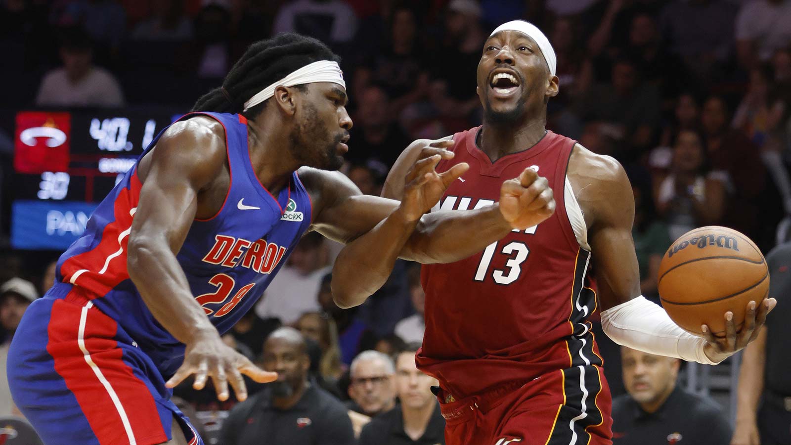 Detroit Pistons forward Isaiah Stewart (28) fouls Miami Heat center Bam Adebayo (13) during the first half at Kaseya Center.