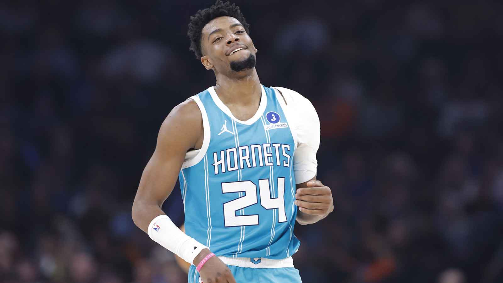Charlotte Hornets forward Brandon Miller (24) smiles as he walks down the court after a play against the Oklahoma City Thunder during the second quarter at Paycom Center.
