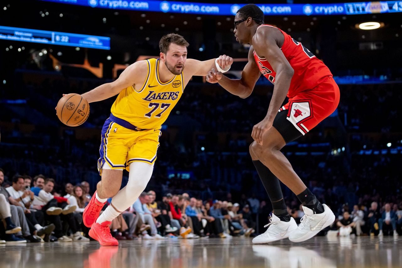 Luka Doncic scores 51, LeBron James returns from injuries to lead Lakers past Bulls 142-130