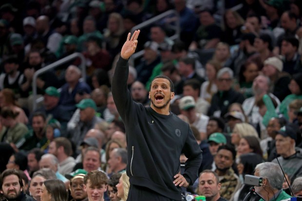 Boston Celtics head coach Joe Mazzulla yells at his team during Wednesday's win over the Warriors. (Staff photo by Stuart Cahill)