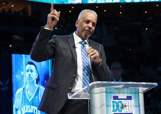 Former Charlotte Hornets forward Dell Curry speaks during his jersey retirement ceremony at Spectrum Center on Thursday, March 19, 2026. The Charlotte Hornets retired Dell Curry's number 30 jersey and lifted a banner into the rafters during half time of the team's game against the Orlando Magic.