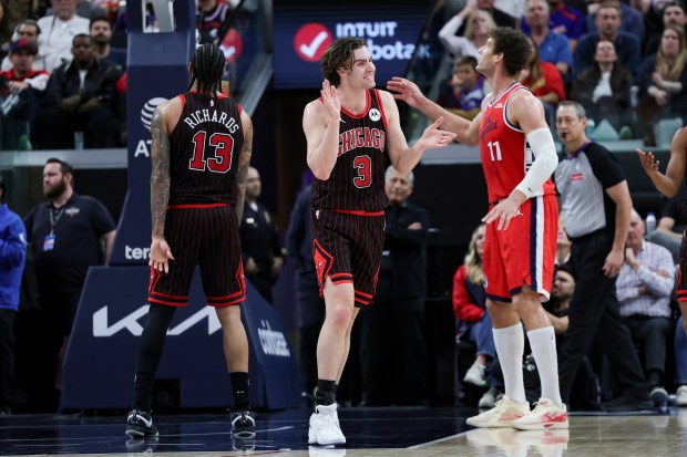 Bulls guard Josh Giddey reacts near Clippers centers Nick Richards and Brook Lopez during the second half on March 13, 2026 in Inglewood, Calif. (AP Photo/Ryan Sun)