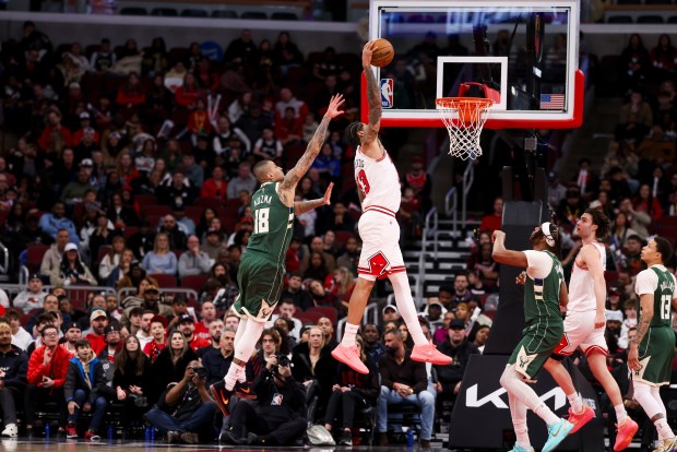 Chicago Bulls center Nick Richards (13) dunks during the fourth quarter against the Milwaukee Bucks at the United Center on Sunday, March 1, 2026. (Eileen T. Meslar/Chicago Tribune)