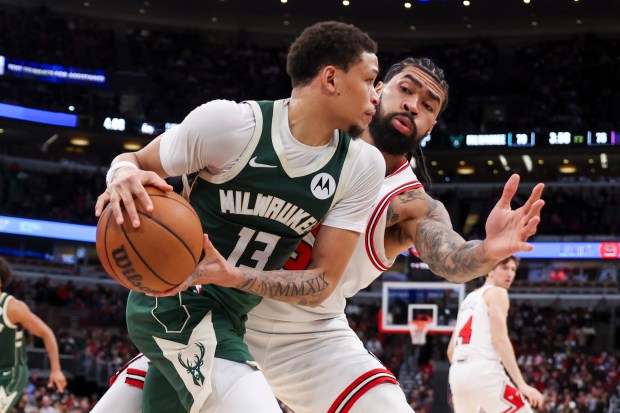 Chicago Bulls center Nick Richards (13) pressures Milwaukee Bucks guard Ryan Rollins (13) during the third quarter at the United Center on Sunday, March 1, 2026. (Eileen T. Meslar/Chicago Tribune)