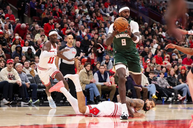 Milwaukee Bucks forward Bobby Portis (9) steals the ball after Chicago Bulls center Nick Richards (13) falls because he lost his shoe during the third quarter at the United Center on Sunday, March 1, 2026. (Eileen T. Meslar/Chicago Tribune)