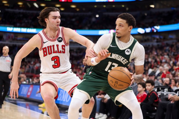 Chicago Bulls guard Josh Giddey (3) guards Milwaukee Bucks guard Ryan Rollins (13) during the third quarter at the United Center on Sunday, March 1, 2026. (Eileen T. Meslar/Chicago Tribune)
