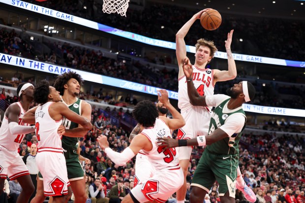 Chicago Bulls forward Matas Buzelis (14) grabs a rebound during the third quarter against the Milwaukee Bucks at the United Center on Sunday, March 1, 2026. (Eileen T. Meslar/Chicago Tribune)