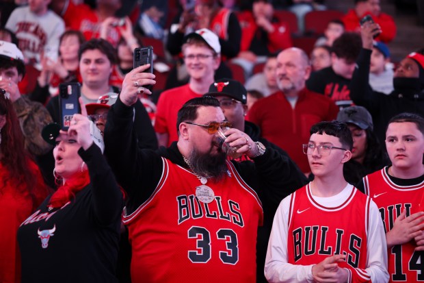 Fans watch player introductions before the Chicago Bulls play the Toronto Raptors at the United Center March 18, 2026 in Chicago. (Armando L. Sanchez/Chicago Tribune)