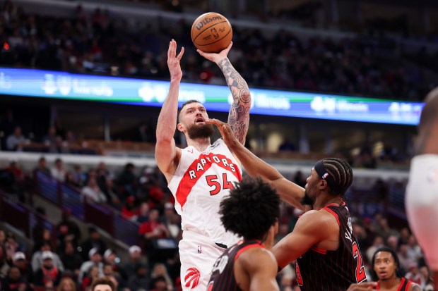 Toronto Raptors forward Sandro Mamukelashvili (54) goes up for a shot during the first quarter against the Chicago Bulls at the United Center March 18, 2026 in Chicago. (Armando L. Sanchez/Chicago Tribune)