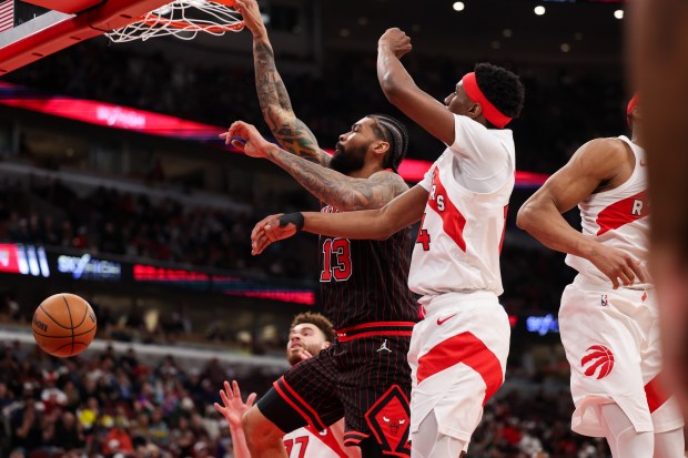 Chicago Bulls center Nick Richards (13) dunks the ball during the third quarter against the Toronto Raptors at the United Center March 18, 2026 in Chicago. (Armando L. Sanchez/Chicago Tribune)