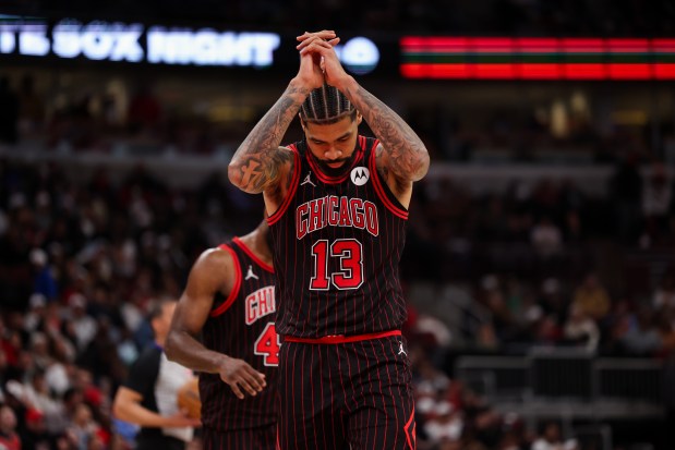 Chicago Bulls center Nick Richards (13) walks to the bench after the Bulls called a timeout during the fourth quarter against the Toronto Raptors at the United Center March 18, 2026 in Chicago. (Armando L. Sanchez/Chicago Tribune)