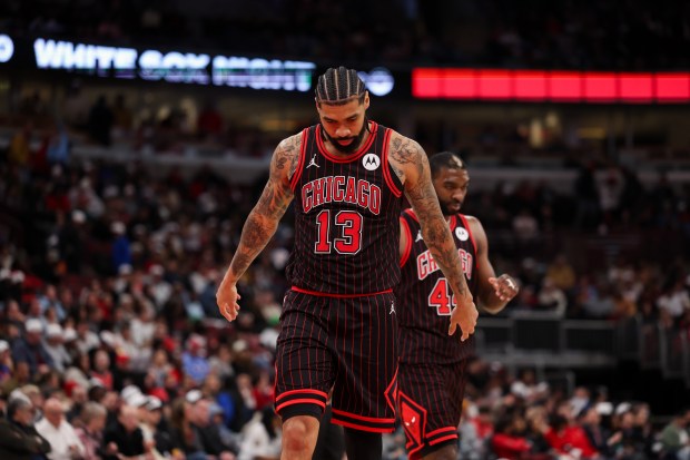 Chicago Bulls center Nick Richards (13) walks to the bench after the Bulls called a timeout during the fourth quarter against the Toronto Raptors at the United Center March 18, 2026 in Chicago. (Armando L. Sanchez/Chicago Tribune)