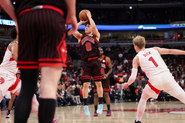 Chicago Bulls guard Yuki Kawamura (8) goes up for his first basket of the game during the fourth quarter against the Toronto Raptors at the United Center March 18, 2026 in Chicago. (Armando L. Sanchez/Chicago Tribune)