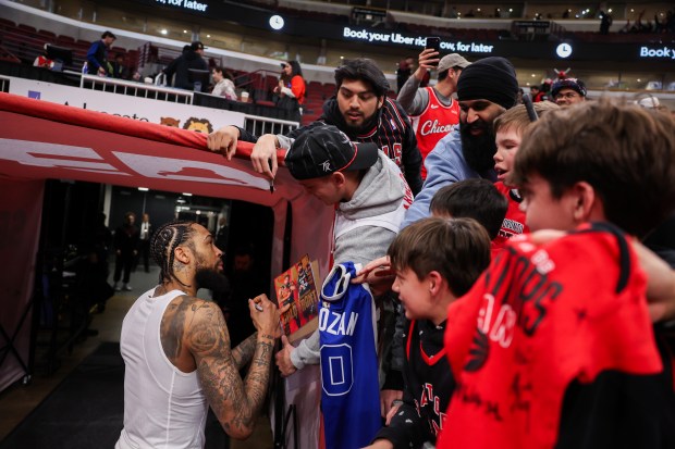 Toronto Raptors forward Brandon Ingram (3) signs autographs after the Raptors defeated the Chicago Bulls, 139-109, at the United Center March 18, 2026 in Chicago. (Armando L. Sanchez/Chicago Tribune)