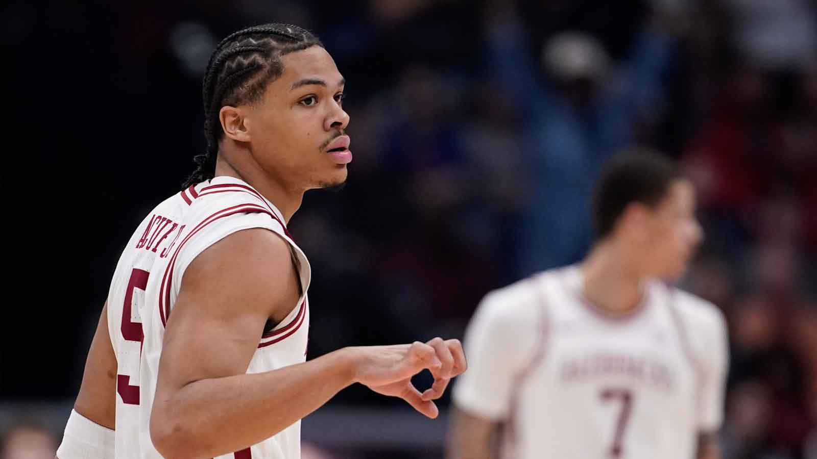 Arkansas guard Darius Acuff Jr. (5) celebrates a three-pointer during the first half of the SEC tournament championship game against Vanderbilt at Bridgestone Arena in Nashville, Tenn.