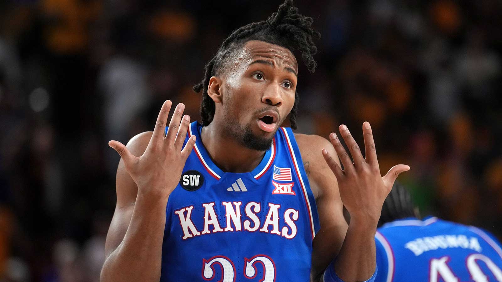 Kansas Jayhawks guard Darryn Peterson (22) looks to the referee after getting a foul called against him as they play the ASU Sun Devils at Desert Financial Arena in Tempe on March 3, 2026.