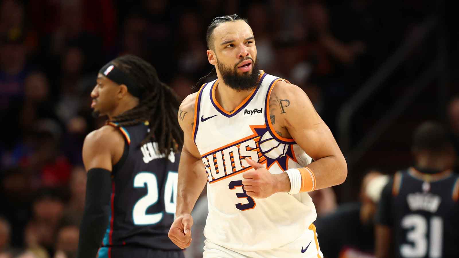 Phoenix Suns forward Dillon Brooks (3) reacts against the Detroit Pistons in the second half at Mortgage Matchup Center.