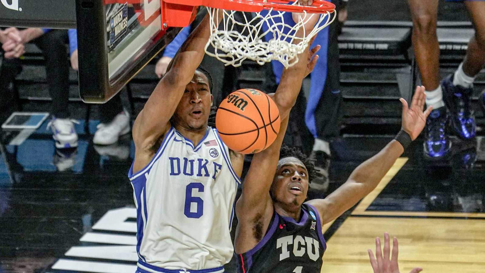 Patrick Ngongba II appears in a boot after Duke basketball beats TCU in March Madness as the Blue Devils advance to the Sweet 16.