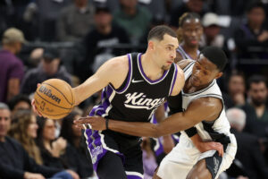 SACRAMENTO, CALIFORNIA - MARCH 07: Zach LaVine #8 of the Sacramento Kings is guarded by De'Aaron Fox #4 of the San Antonio Spurs at Golden 1 Center on March 07, 2025 in Sacramento, California. NOTE TO USER: User expressly acknowledges and agrees that, by downloading and/or using this photograph, user is consenting to the terms and conditions of the Getty Images License Agreement. (Photo by Ezra Shaw/Getty Images)