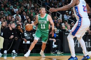 BOSTON, MA - OCTOBER 22: Payton Pritchard #11 of the Boston Celtics dribbles the ball during the game against the Philadelphia 76ers on October 22, 2025 at TD Garden in Boston, Massachusetts.