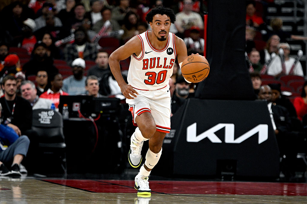 CHICAGO, ILLINOIS - OCTOBER 16: Tre Jones #30 of the Chicago Bulls dribbles during the first half of the preseason game between the Chicago Bulls and the Minnesota Timberwolves at the United Center on October 16, 2025 in Chicago, Illinois. NOTE TO USER: User expressly acknowledges and agrees that, by downloading and or using this photograph, User is consenting to the terms and conditions of the Getty Images License Agreement. (Photo by Zoe Davis/Getty Images)