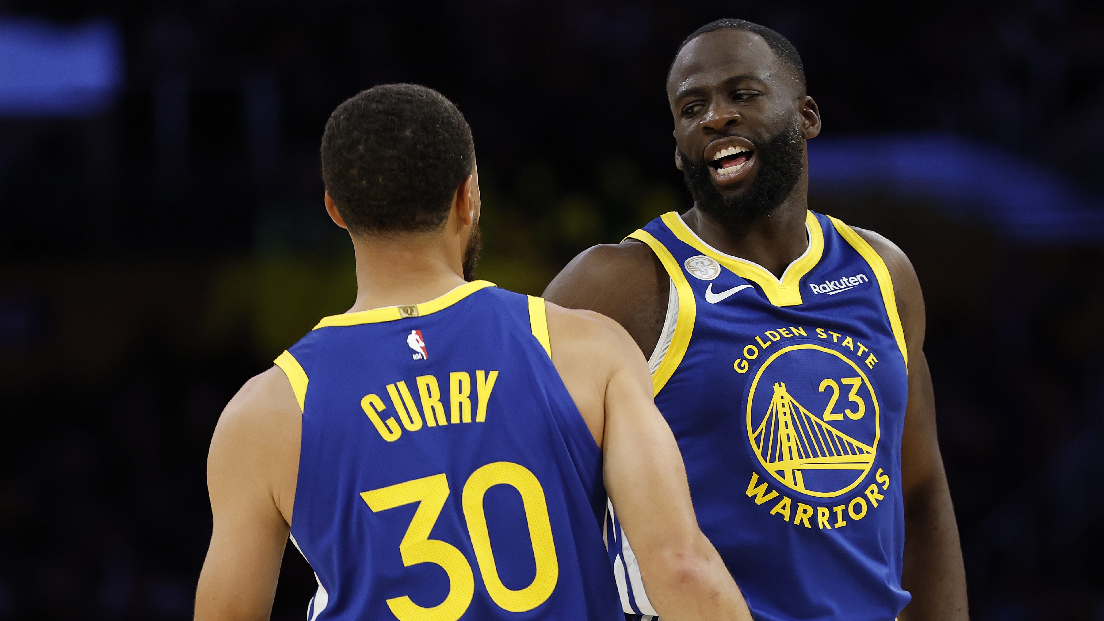 Golden State Warriors point guard Stephen Curry and forward Draymond Green