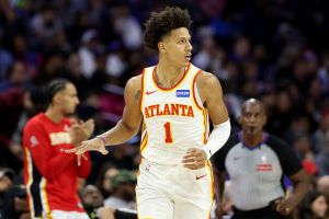 PHILADELPHIA, PENNSYLVANIA - NOVEMBER 30: Jalen Johnson #1 of the Atlanta Hawks celebrates a three-pointer during the first half against the Philadelphia 76ers at Xfinity Mobile Arena on November 30, 2025 in Philadelphia, Pennsylvania. NOTE TO USER: User expressly acknowledges and agrees that, by downloading and or using this photograph, User is consenting to the terms and conditions of the Getty Images License Agreement. (Photo by Emilee Chinn/Getty Images)