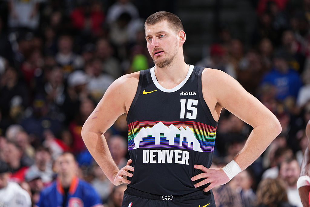 DENVER, CO - DECEMBER 20: Nikola Jokic #15 of the Denver Nuggets looks on during the game against the Houston Rockets on December 20, 2025 at Ball Arena in Denver, Colorado. NOTE TO USER: User expressly acknowledges and agrees that, by downloading and/or using this Photograph, user is consenting to the terms and conditions of the Getty Images License Agreement. Mandatory Copyright Notice: Copyright 2025 NBAE (Photo by Garrett Ellwood/NBAE via Getty Images)