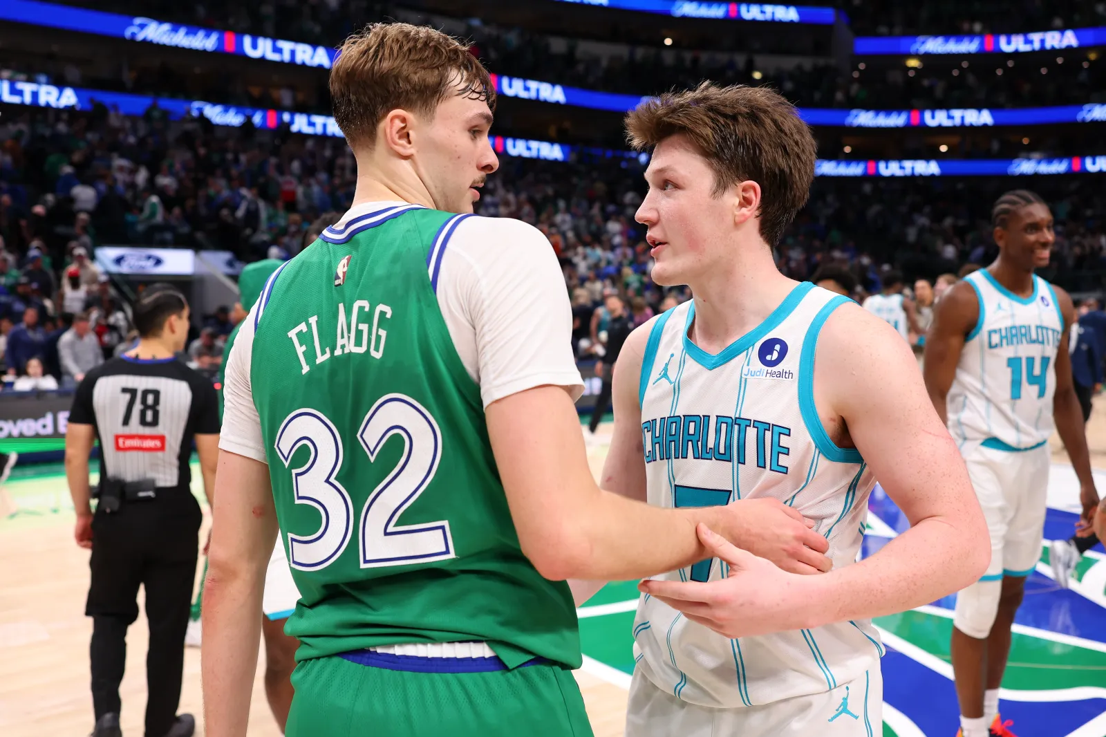 Cooper Flagg #32 of the Dallas Mavericks and Kon Knueppel #7 of the Charlotte Hornets.