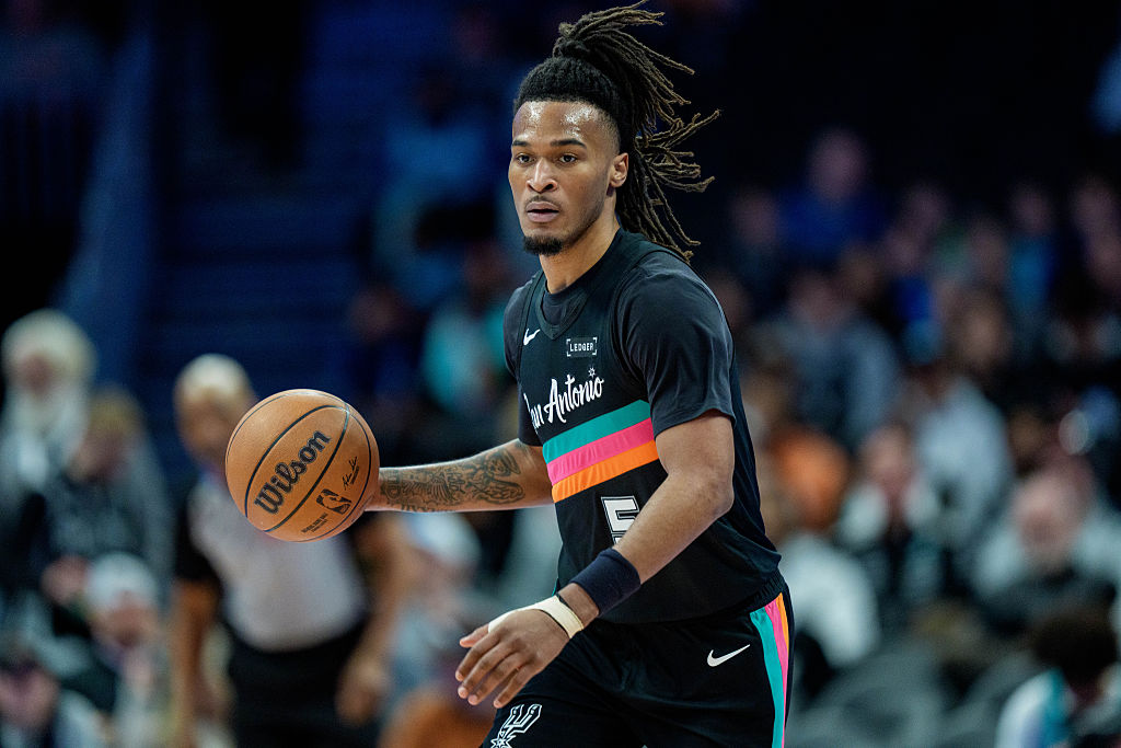 CHARLOTTE, NORTH CAROLINA - JANUARY 31: Stephon Castle #5 of the San Antonio Spurs plays against the Charlotte Hornets during their game at Spectrum Center on January 31, 2026 in Charlotte, North Carolina. NOTE TO USER: User expressly acknowledges and agrees that, by downloading and or using this photograph, User is consenting to the terms and conditions of the Getty Images License Agreement. (Photo by Jacob Kupferman/Getty Images)