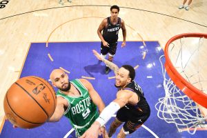PHOENIX, AZ - FEBRUARY 24: Derrick White #9 of the Boston Celtics drives to the basket during the game against the Phoenix Suns on February 24, 2026 at PHX Arena in Phoenix, Arizona. NOTE TO USER: User expressly acknowledges and agrees that, by downloading and or using this photograph, user is consenting to the terms and conditions of the Getty Images License Agreement. Mandatory Copyright Notice: Copyright 2026 NBAE (Photo by Barry Gossage/NBAE via Getty Images)