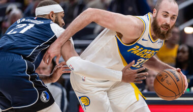 INDIANAPOLIS, INDIANA - FEBRUARY 22: Jay Huff #32 of the Indiana Pacers dribbles against Daniel Gafford #21 of the Dallas Mavericks at Gainbridge Fieldhouse on February 22, 2026 in Indianapolis, Indiana. NOTE TO USER: User expressly acknowledges and agrees that, by downloading and or using this photograph, User is consenting to the terms and conditions of the Getty Images License Agreement. (Photo by Michael Hickey/Getty Images)