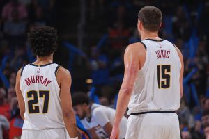 OKLAHOMA CITY, OK - MARCH 9: Jamal Murray #27 and Nikola Jokic #15 of the Denver Nuggets looks on during the game against the Oklahoma City Thunder on March 9, 2026 at Paycom Center in Oklahoma City, Oklahoma. NOTE TO USER: User expressly acknowledges and agrees that, by downloading and or using this photograph, User is consenting to the terms and conditions of the Getty Images License Agreement. Mandatory Copyright Notice: Copyright 2026 NBAE (Photo by Garrett Ellwood/NBAE via Getty Images)