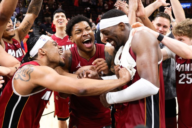 Bam Adebayo of the Miami Heat celebrates with teammates after a 150-129 win against the Washington Wizards at Kaseya Center on March 10, 2026 in Miami, Florida. Adebayo passed Kobe Bryant for the second most points scored in an NBA game with 83. (Photo by Megan Briggs/Getty Images)