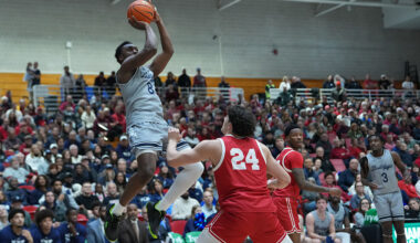 ITHACA, NY - MARCH 14: Yale Bulldogs Forward Isaac Celiscar (8) shoots a jump shot against Cornell Big Red Guard Josh Baldwin (24) during the second half of the Ivy League Semi-Final game between the Cornell Big Red and the Yale Bulldogs on March 14, 2026, at Newman Arena in Ithaca, NY. (Photo by Gregory Fisher/Icon Sportswire via Getty Images)