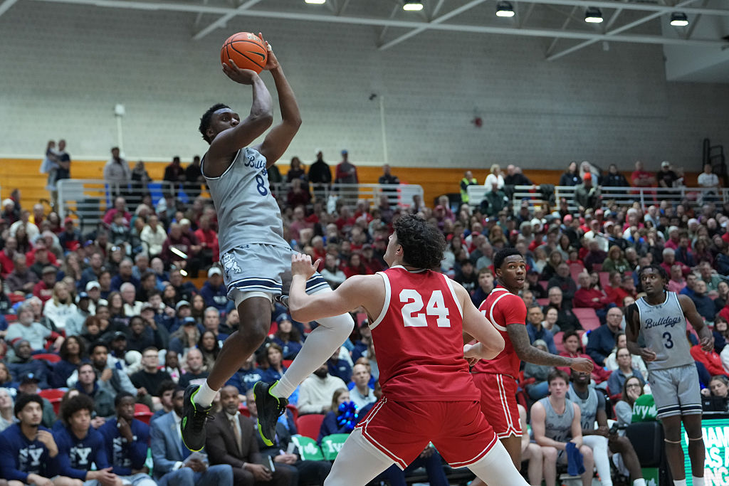 ITHACA, NY - MARCH 14: Yale Bulldogs Forward Isaac Celiscar (8) shoots a jump shot against Cornell Big Red Guard Josh Baldwin (24) during the second half of the Ivy League Semi-Final game between the Cornell Big Red and the Yale Bulldogs on March 14, 2026, at Newman Arena in Ithaca, NY. (Photo by Gregory Fisher/Icon Sportswire via Getty Images)