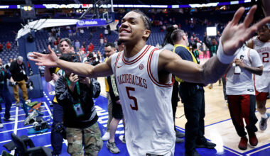 NASHVILLE, TN - MARCH 14: Arkansas Razorbacks guard Darius Acuff Jr. (5) holds his hands out an cheers to fans as he walks off the floor following a 93-90 win in a semifinal game of the SEC Tournament between the Mississippi Rebels and Arkansas Razorbacks, March 14, 2026 at Bridgestone Arena in Nashville, Tennessee. (Photo by Matthew Maxey/Icon Sportswire via Getty Images)